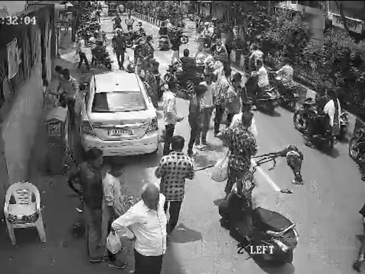 A crowd of people gathered at the scene.