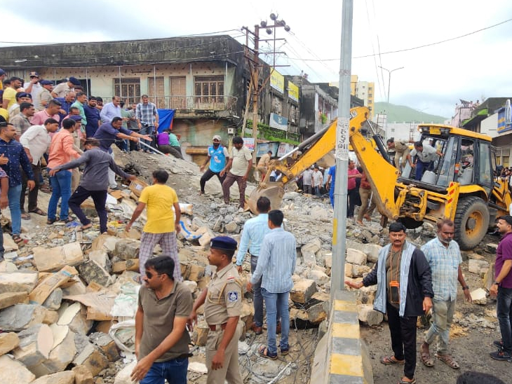 Rescue operations are carried out with equipment including JCB